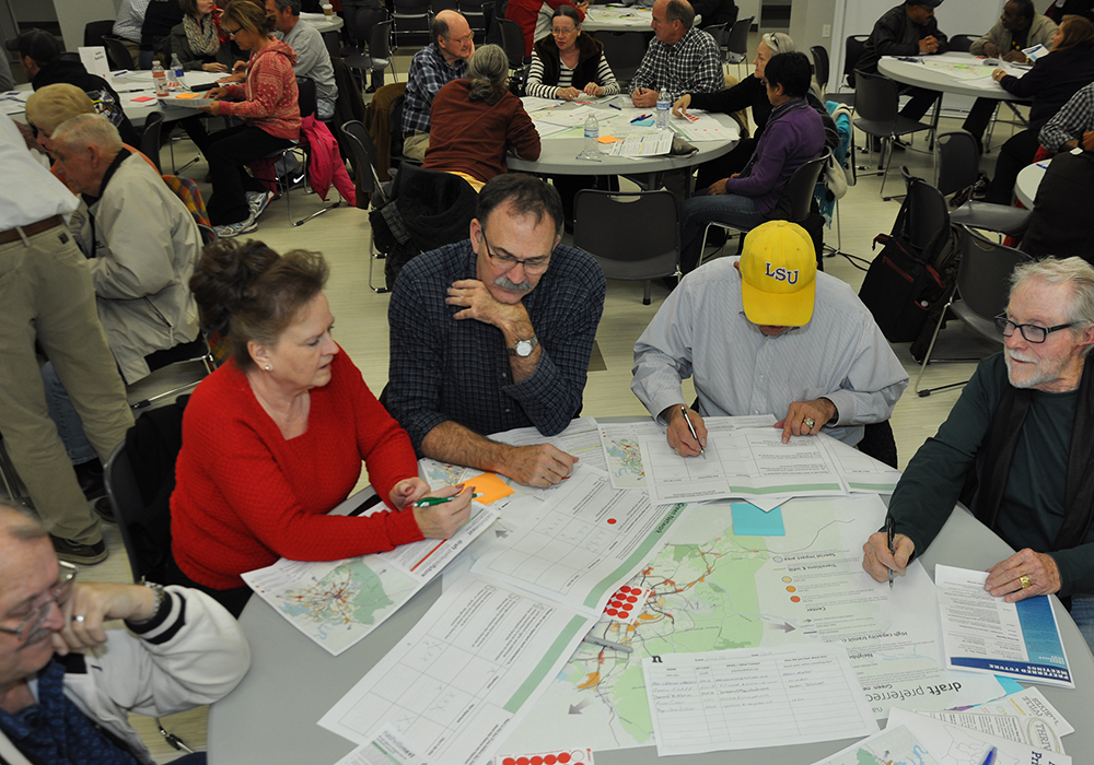 Community members review the Preferred Future by rating the importance of different ways to implement it
